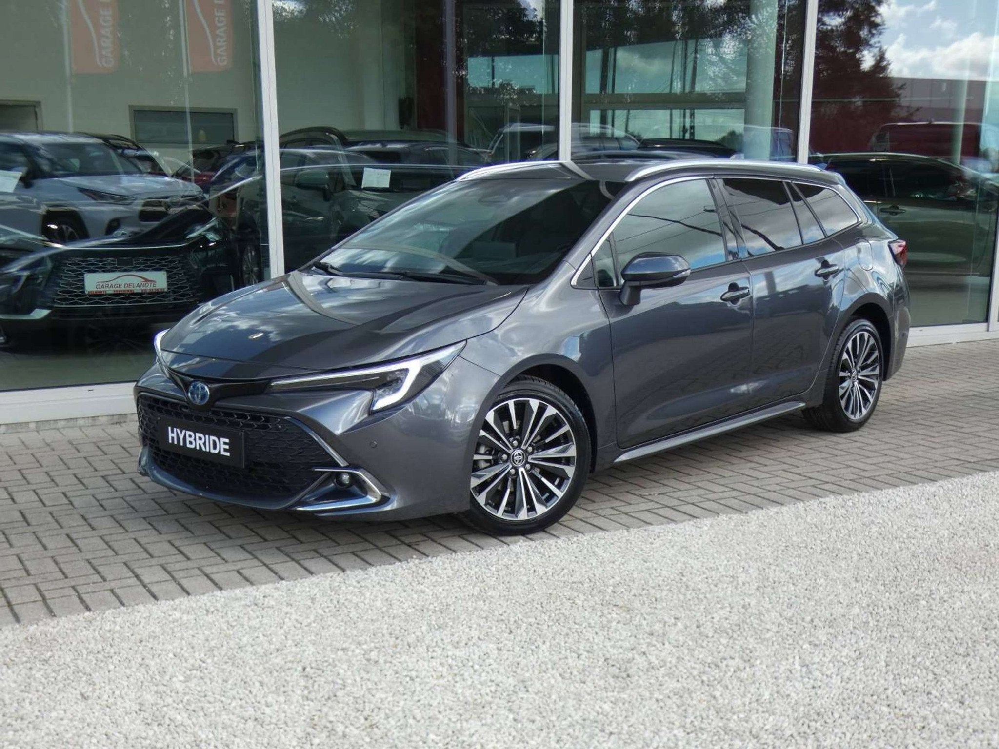Toyota Corolla 1.8 Hybrid STYLE+TECH PACK 140pk +Elektrische, Auto's, 1300 kg, Gebruikt, Zwart, 4 cilinders