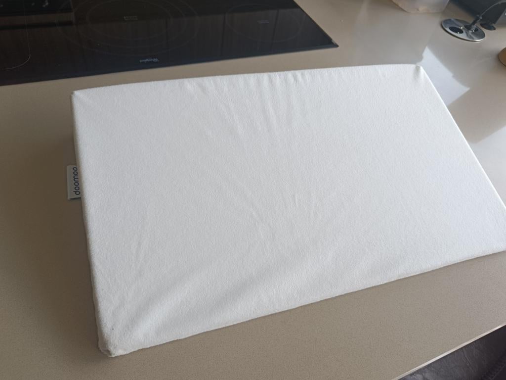 Doomoo kussen verhogen, Ophalen