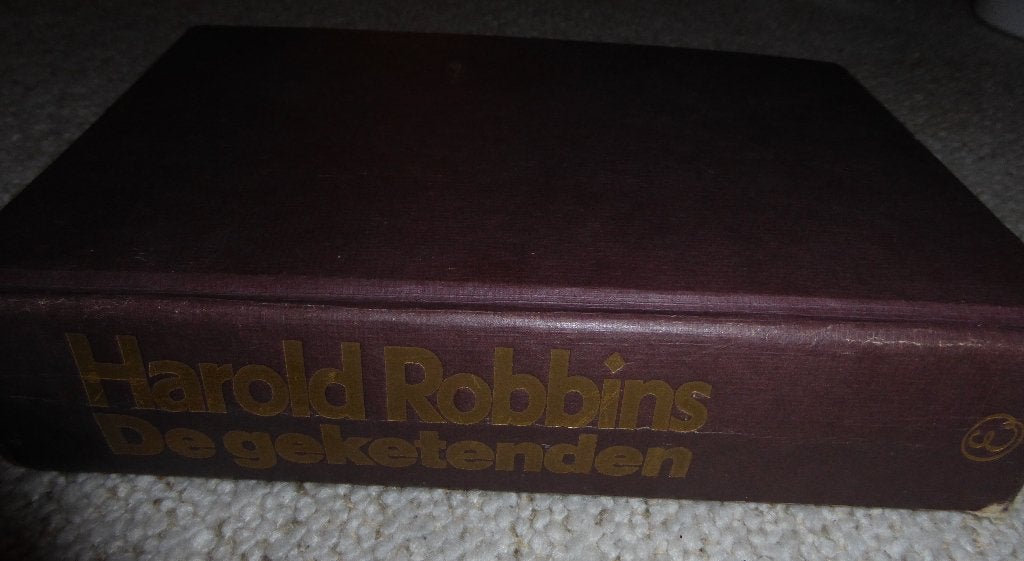 Roman " De geketenden " Harold Robbins, Boeken, Ophalen, Gelezen