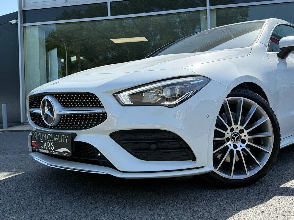 Mercedes-Benz CLA 200 AMG Line / WIDE SCREEN / SFEERVERLICHT, Automaat, Zwart, 4 cilinders, Leder en Stof