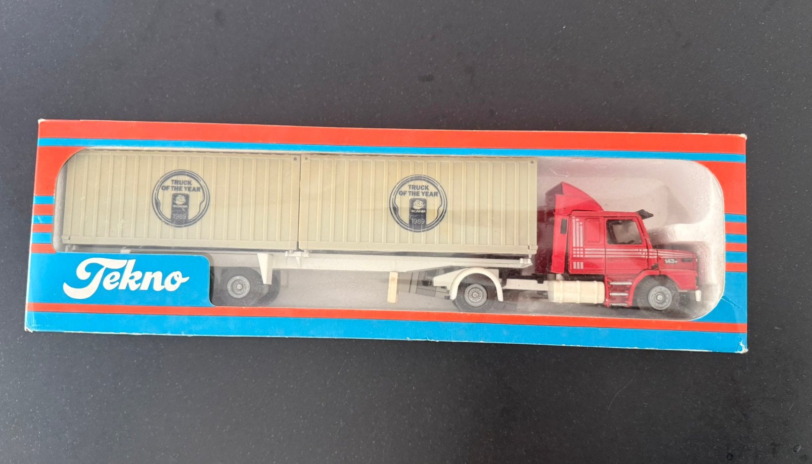 Tekno Scania 143 1:50–Truck of the Year 1989–Made in Holland, Hobby en Vrije tijd, Modelauto's | 1:50, Ophalen of Verzenden, Gebruikt