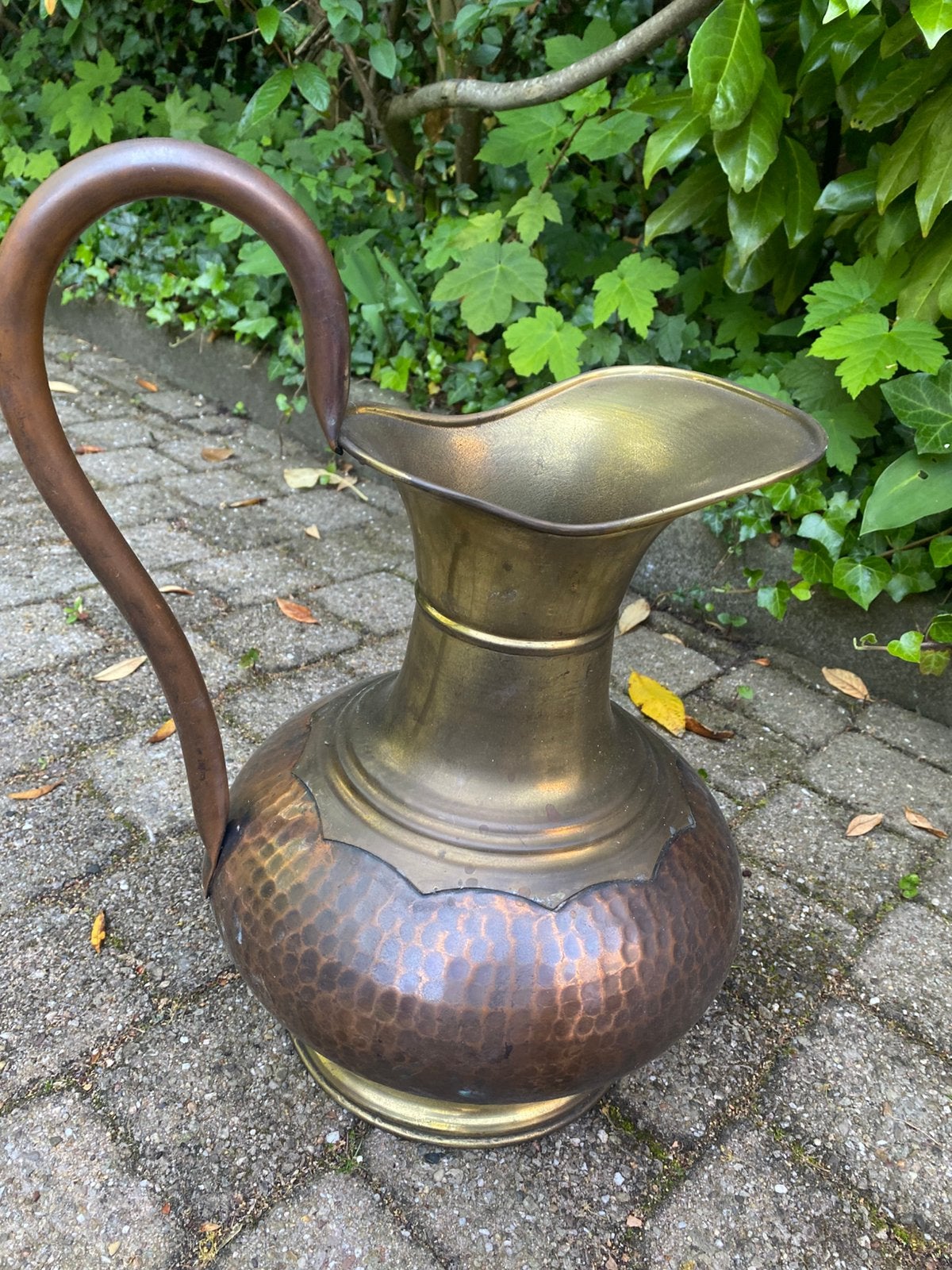 Koperen kruik, Ophalen