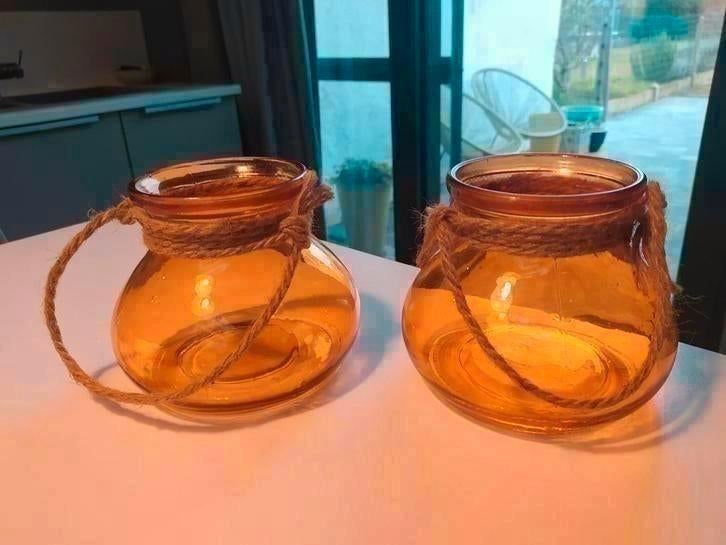 Twee oranjekleurige glazen potten, Tuin en Terras, Ophalen of Verzenden
