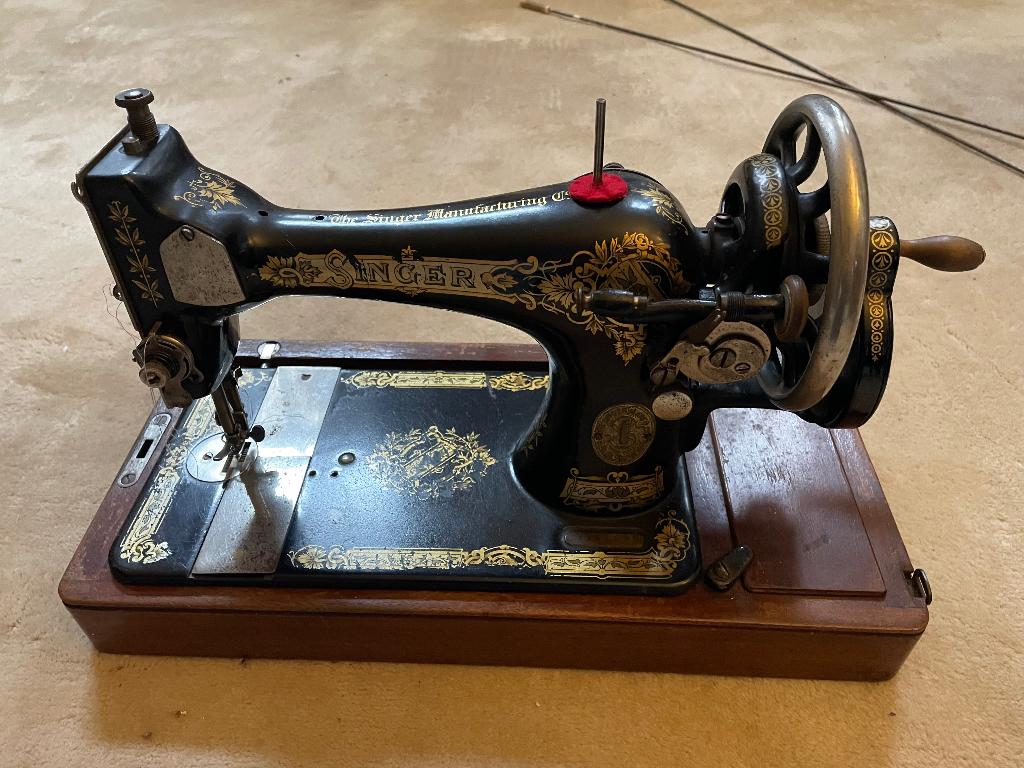 Oude singer naaimachine, Ophalen