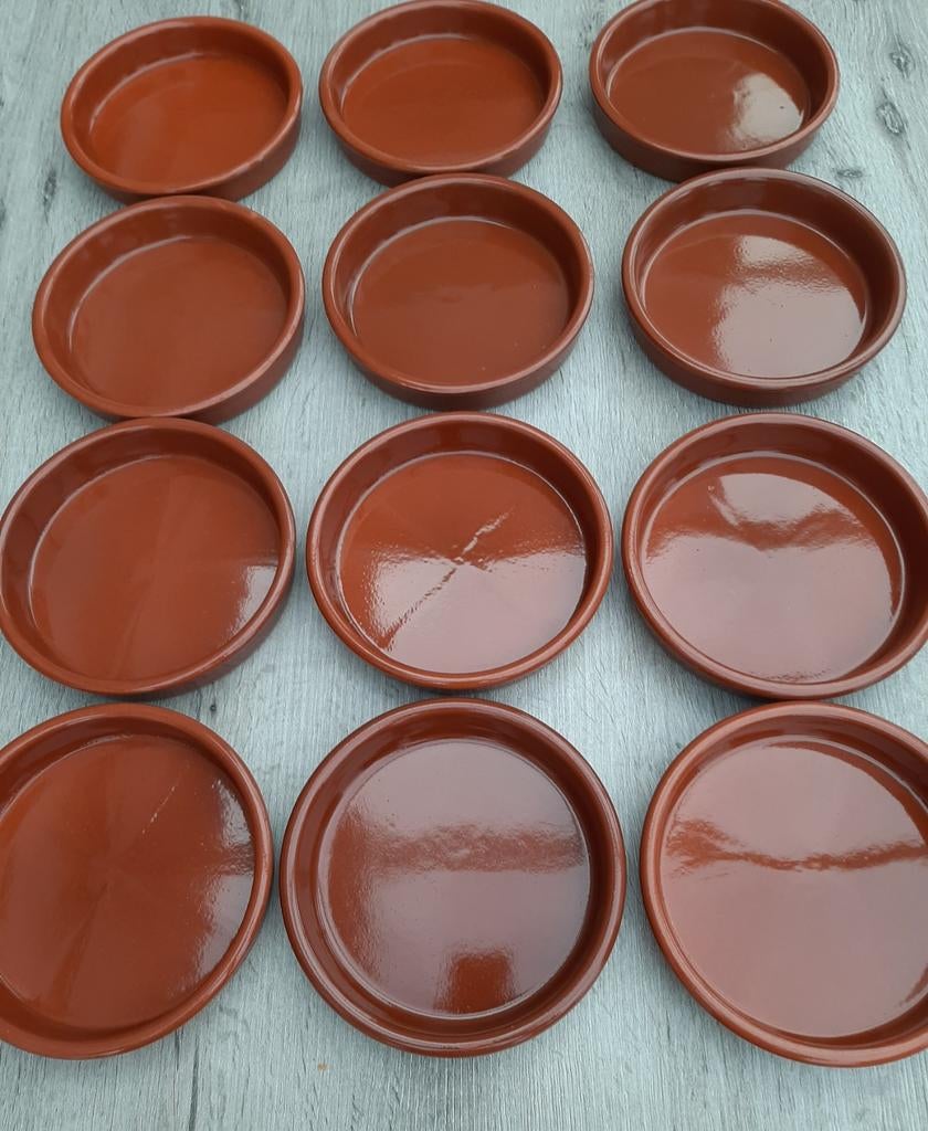 Schoteltjes in terracota, Enlèvement
