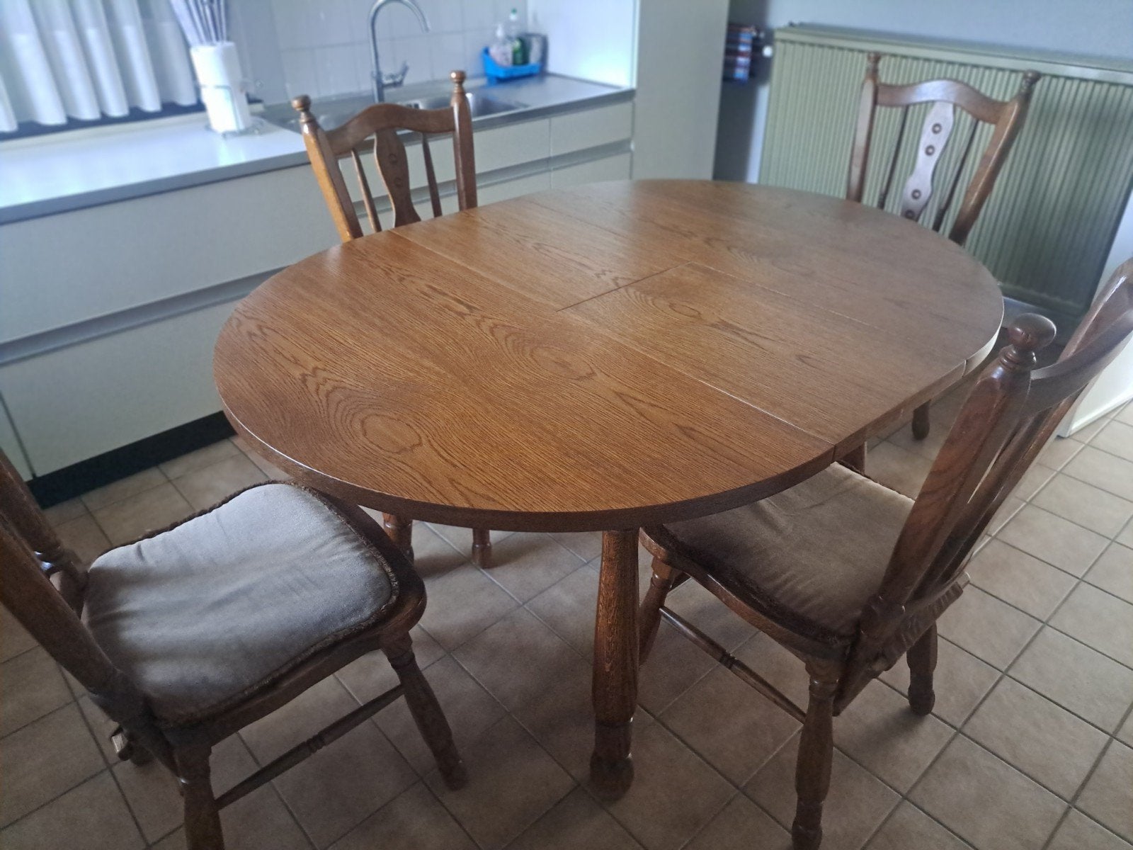 Ronde keukentafel met 4 stoelen, Ophalen