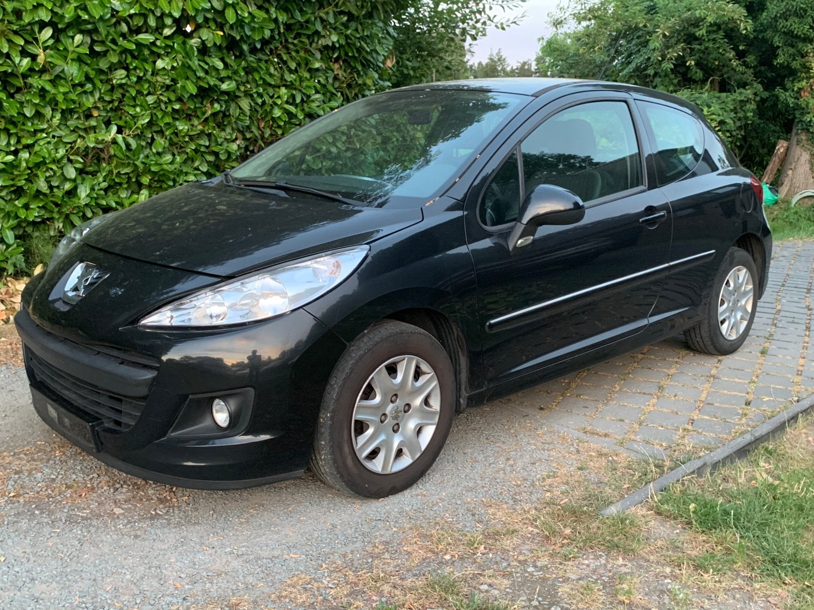 Peugeot 207 benzine 1.4 i bj.2012 160.000km servo probleem, Auto's, Voorwielaandrijving, Euro 5, Stof, Zwart