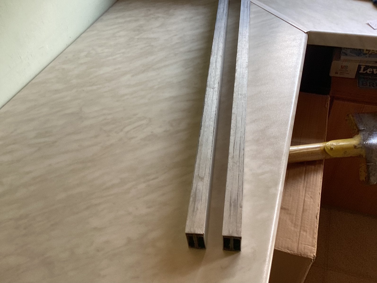 2 profielen in aluminium samen, Ophalen