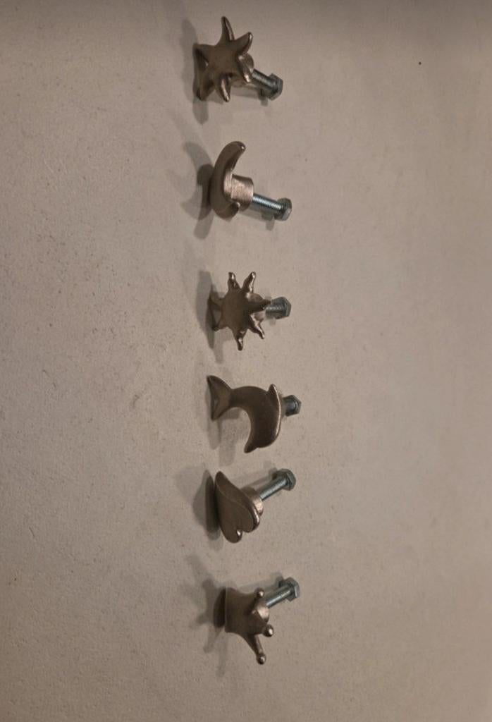 (Kast)deurknoppen met figuren, Ophalen