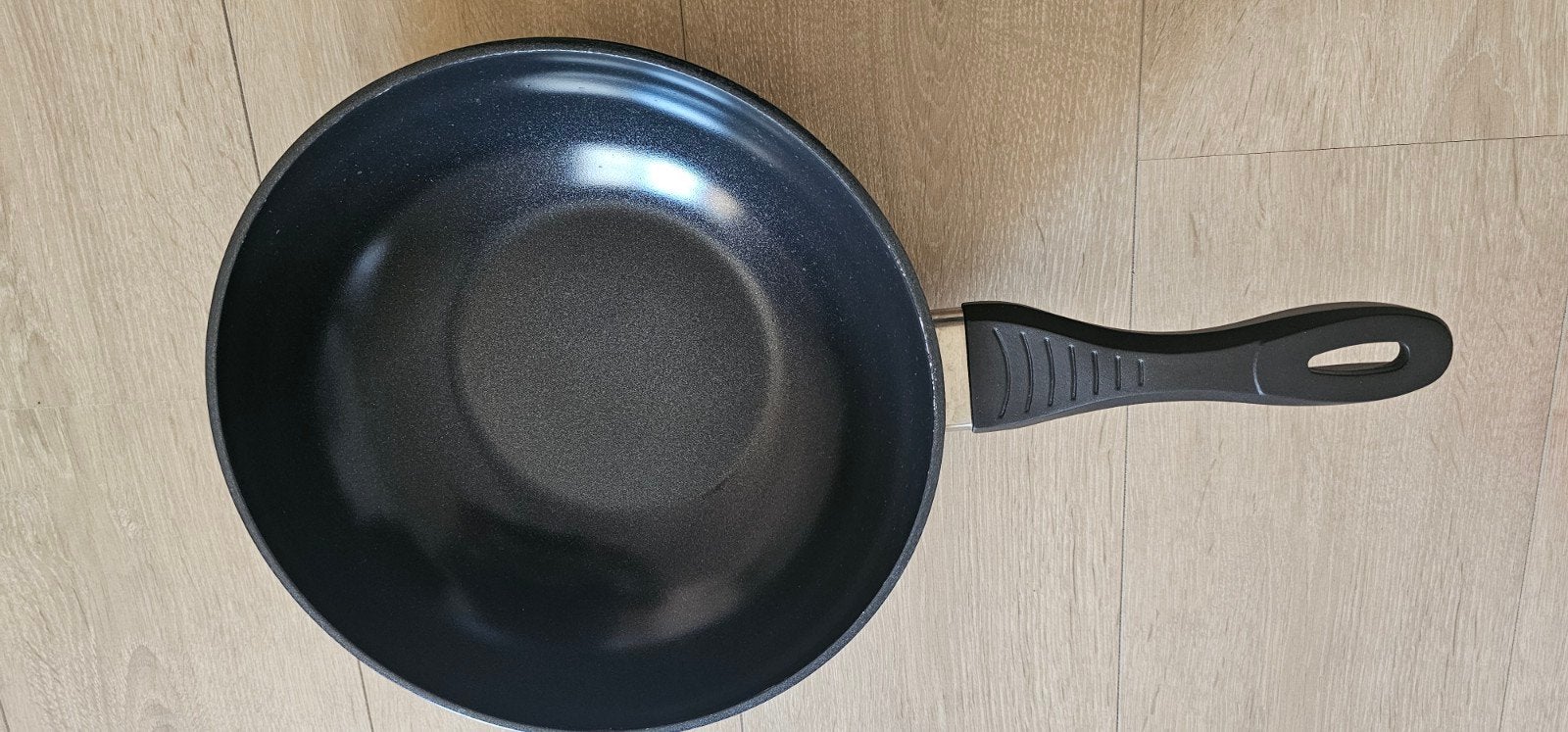 Wokpan zo goed als nieuw, Ophalen