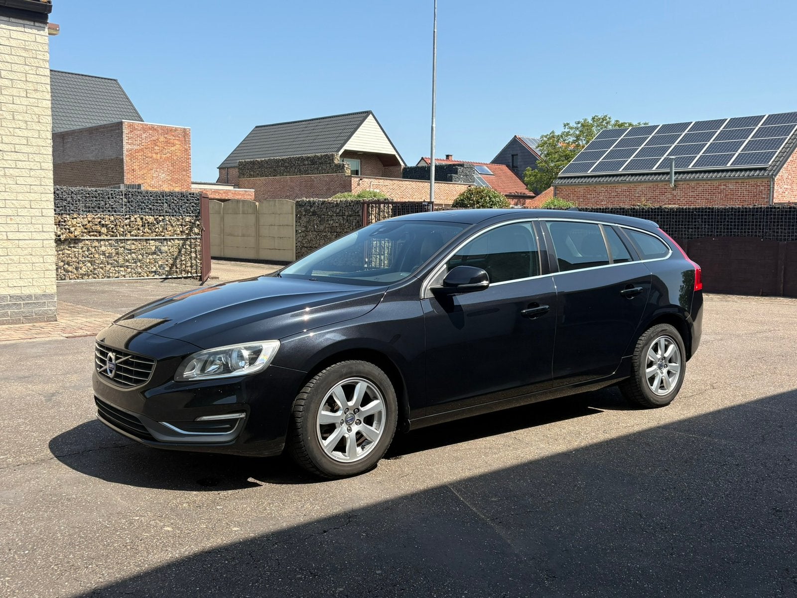 Volvo V60 D2 Momentum – 2014 – 235.645 km, Auto's, Parkeersensor, Euro 5, Zwart, Leder