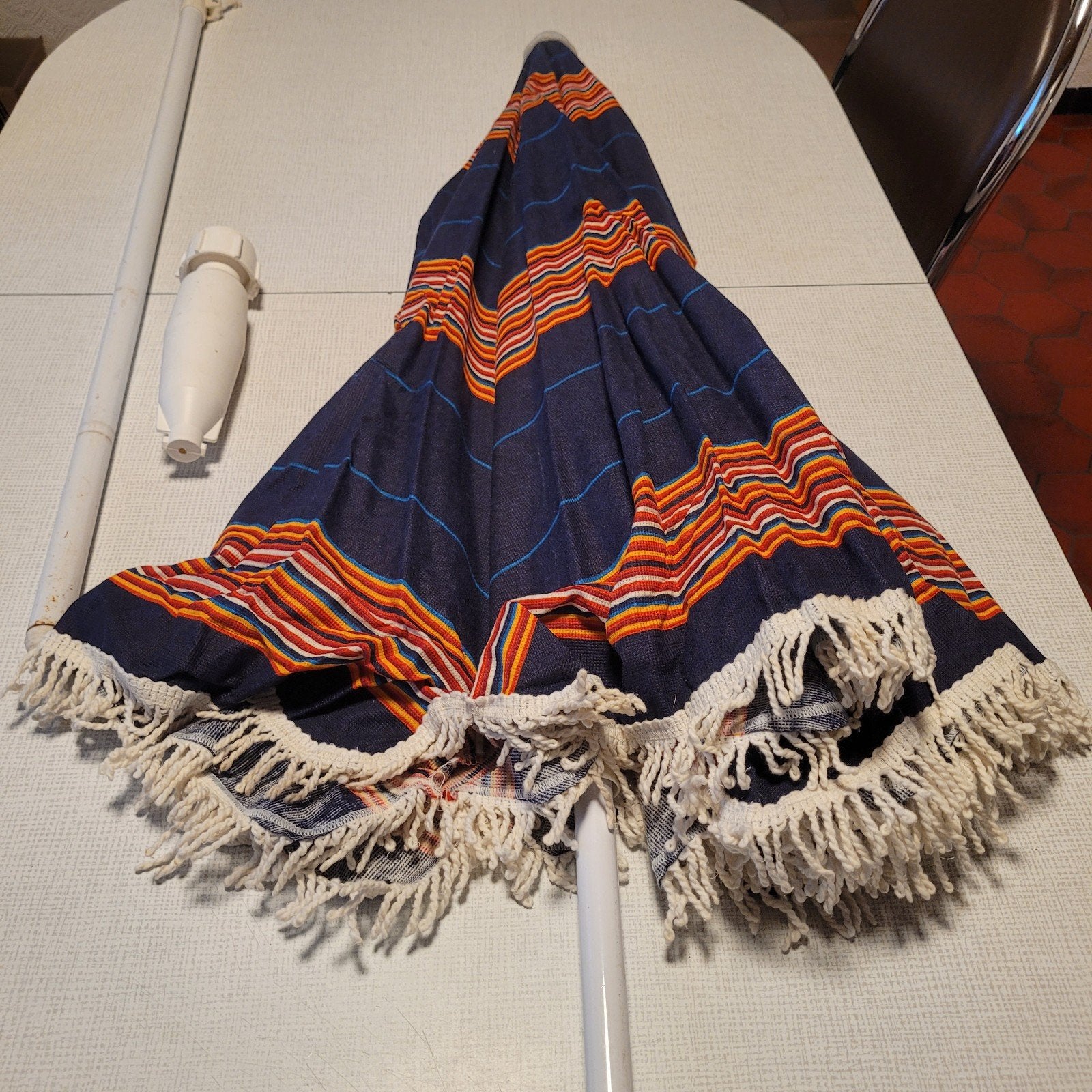 Vintage strandparasol, Ophalen