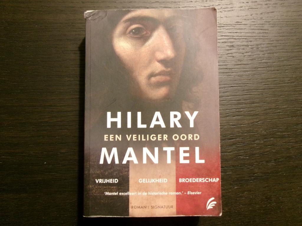 Een veiliger oord   -Hillary  Mantel-, Ophalen of Verzenden