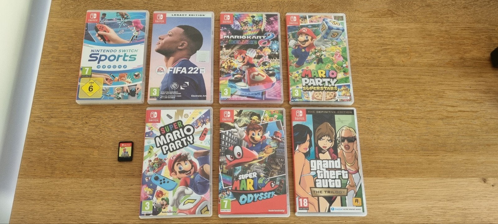 Nintendo Switch V2 + 8 spelletjes, Enlèvement