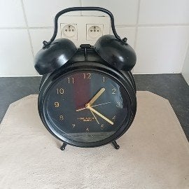 decoratieve zwarte klok, Enlèvement