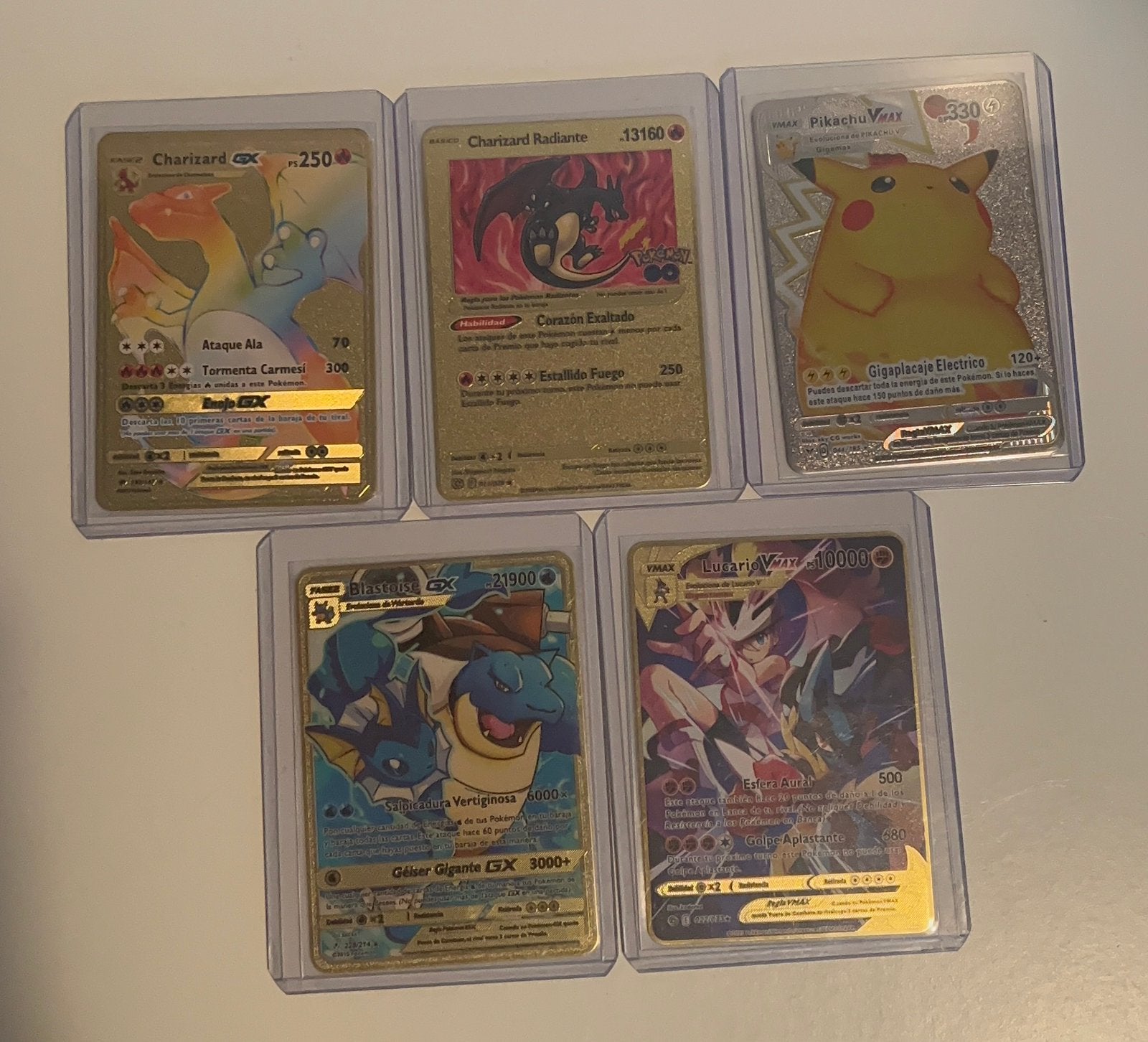 Set van 5 metalen Pokémon kaarten – Spaanse versie, Hobby en Vrije tijd, Ophalen of Verzenden, Zo goed als nieuw, Meerdere kaarten