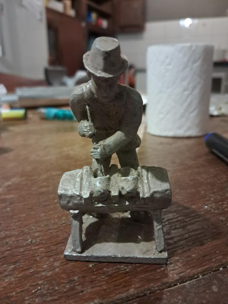 Tinnen figuur., Ophalen
