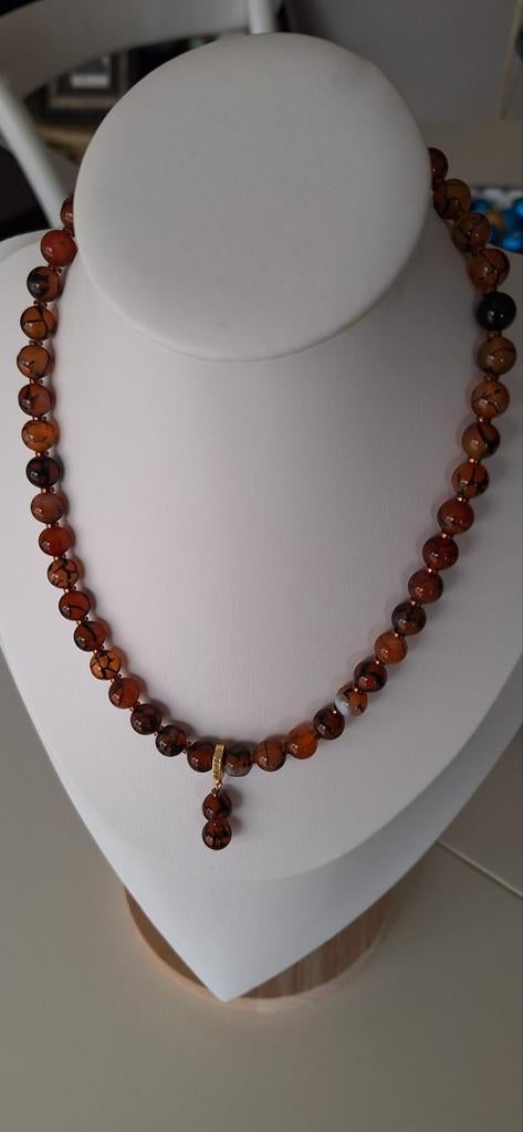 Ketting halfedelstenen, Envoi