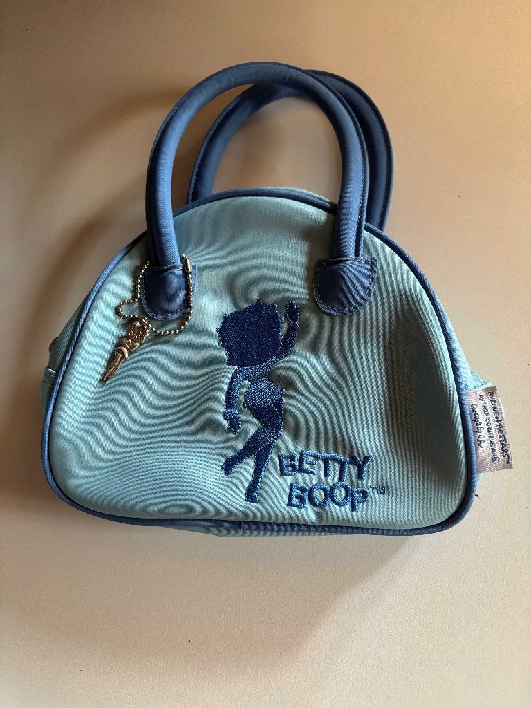 Betty Boop hemelsblauwe kleine tas., Ophalen of Verzenden, Betty Boop, Zo goed als nieuw, Overige typen