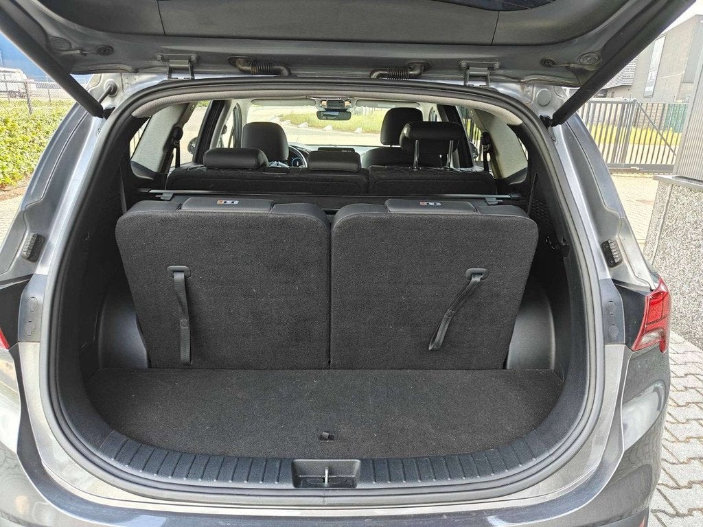 Hyundai Santa Fe 1.6 HEV T-GDi 180pk 7-zit/MemoryLeder/AdCru, Autos, Hyundai, Argent ou Gris, Entreprise, 7 places, 179 ch