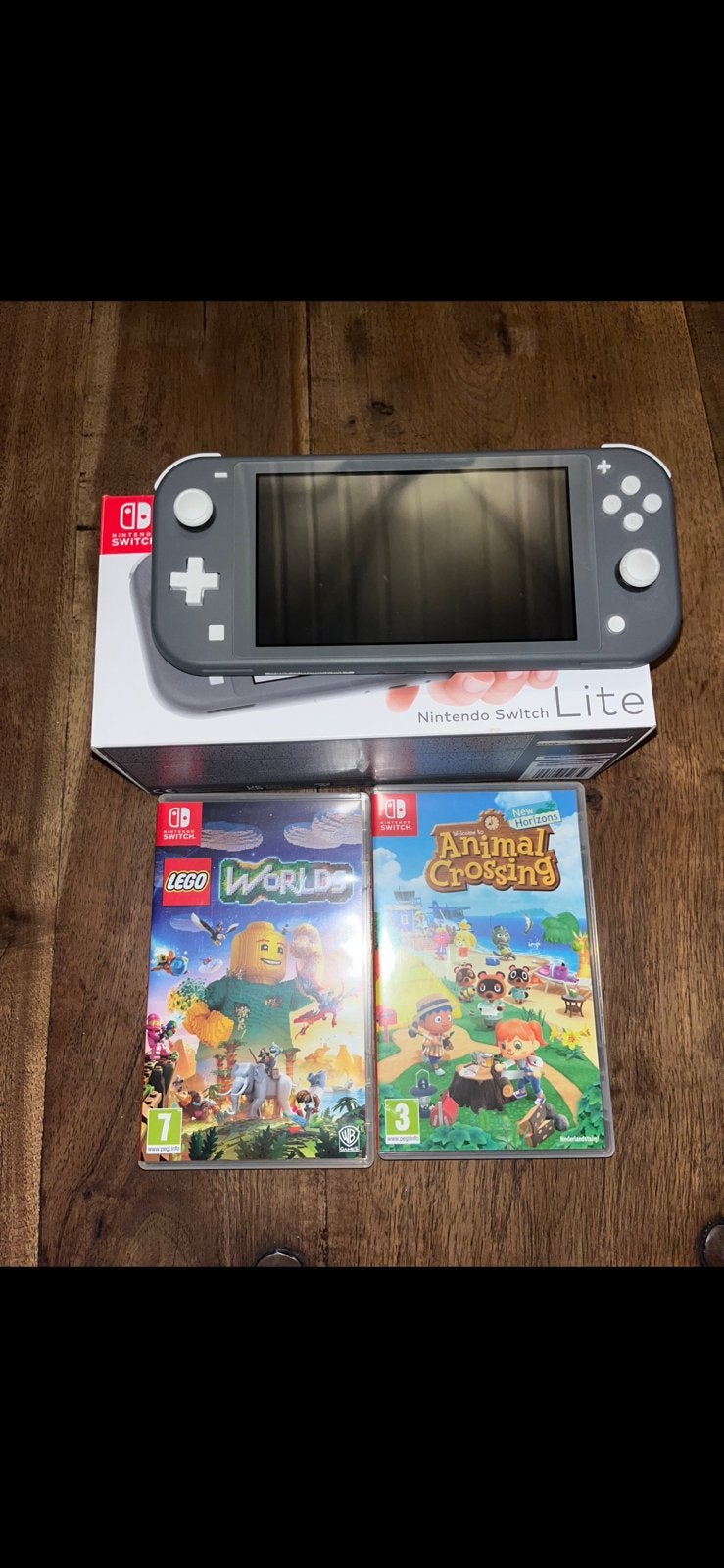 Nintendo Switch Lite Grijs + Animal Crossing + LEGO Worlds, Games en Spelcomputers, Ophalen, Grijs, Zo goed als nieuw