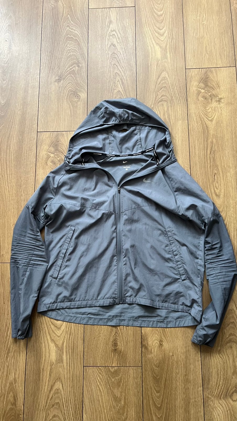 Nike performance hardloopjack Grijs, Kleding | Heren, Ophalen of Verzenden, Gedragen, Maat 52/54 (L), Grijs