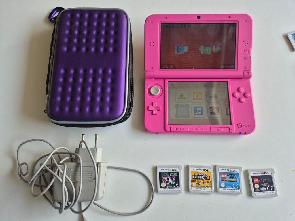 Nintendo 3ds XL console + lader + hoesje + games, Ophalen of Verzenden, Zo goed als nieuw, 3DS
