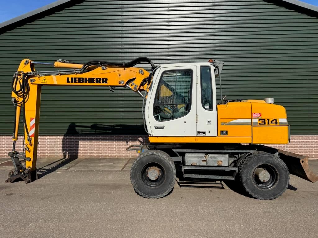 Liebherr A 314 Litronic (bj 2009), Graafmachine