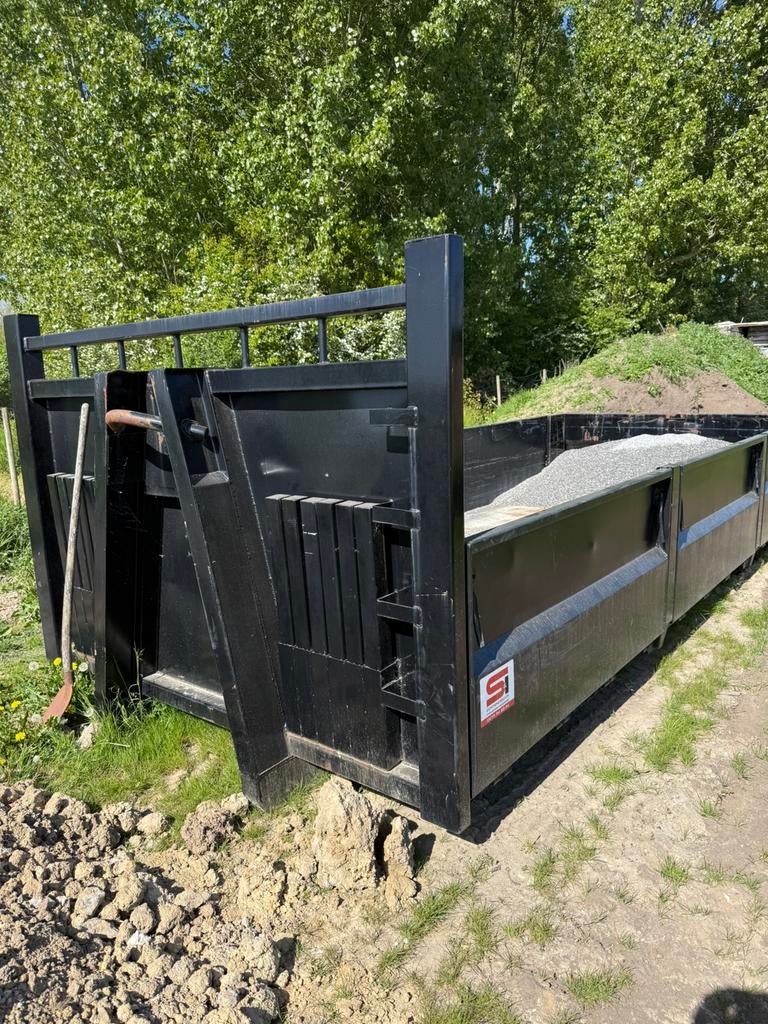 Container  met zij schotten, Ophalen