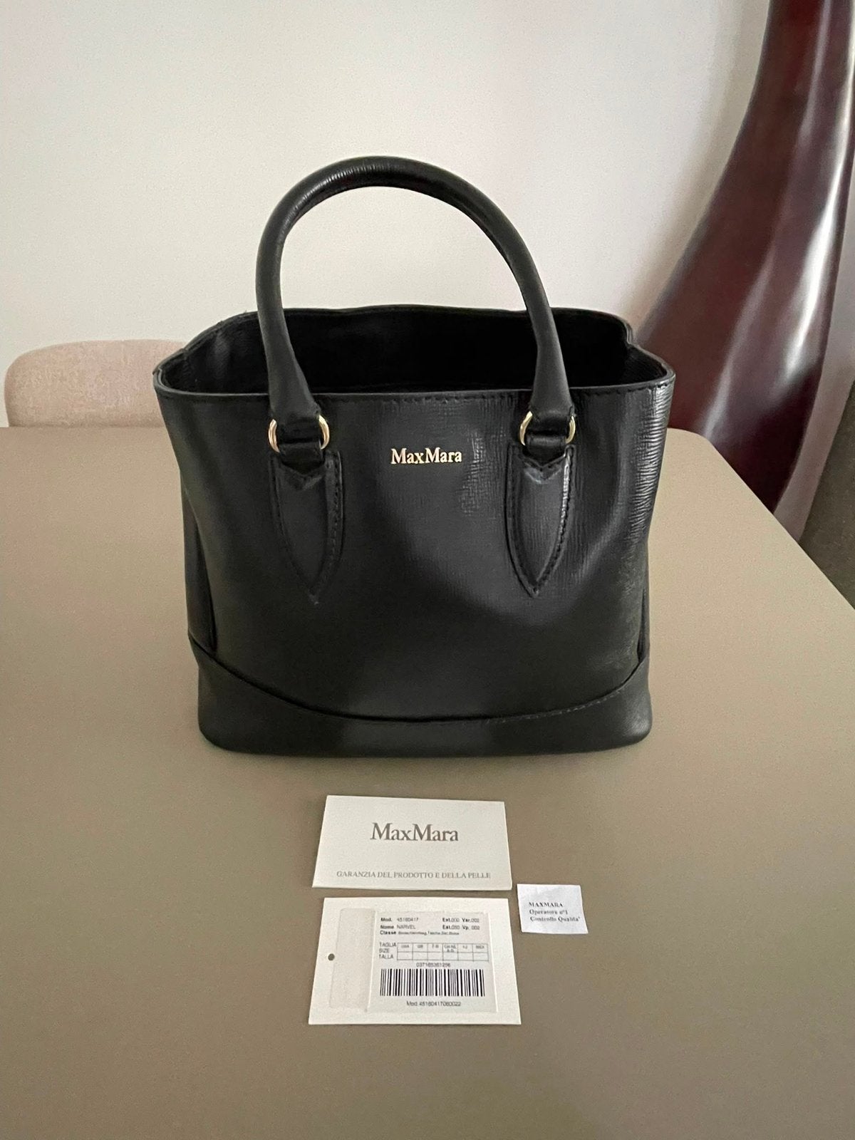 Sac MaxMara, Enlèvement