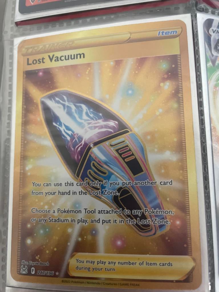 Lost vacuum pokemon trainer zeldzaam, Hobby en Vrije tijd, Verzamelkaartspellen | Yu-gi-Oh!, Ophalen, Zo goed als nieuw, Losse kaart