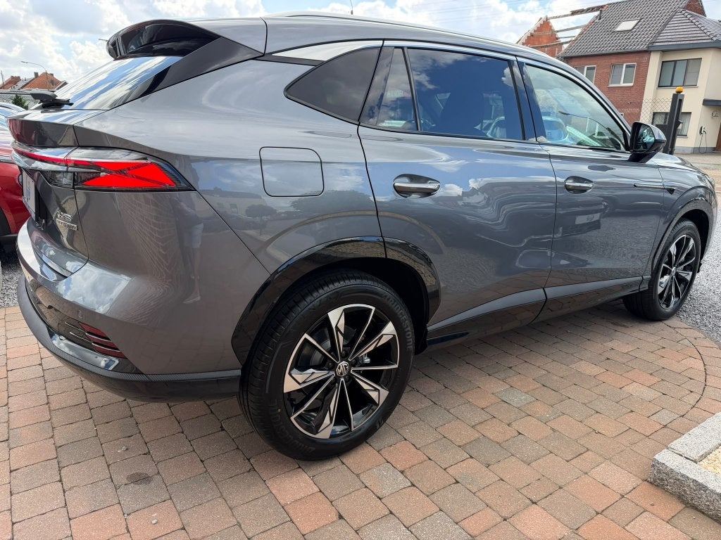 MG HS Hybrid+ 1.5 Luxury 224PK 7J/FABRIEKSWAARBORG NIEUW 0KM, Autos, Achat, Euro 6, Entreprise, Noir