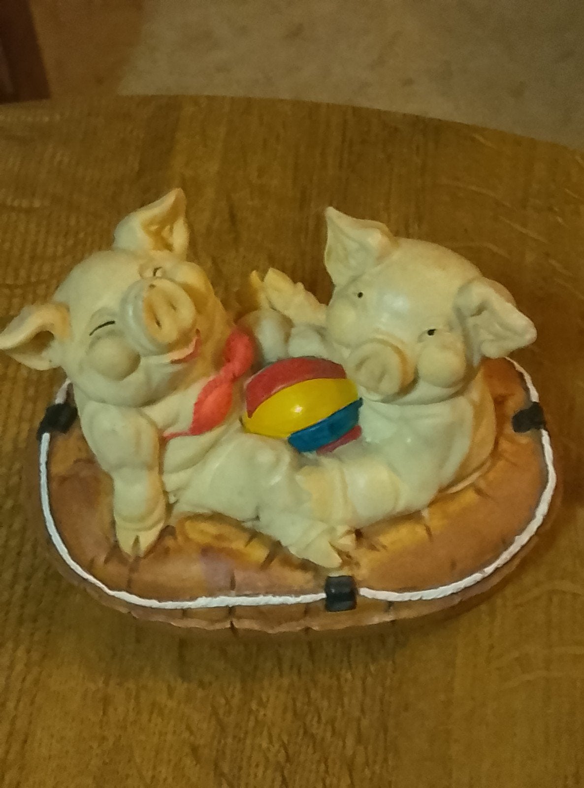 koppel varkens in boot, Ophalen