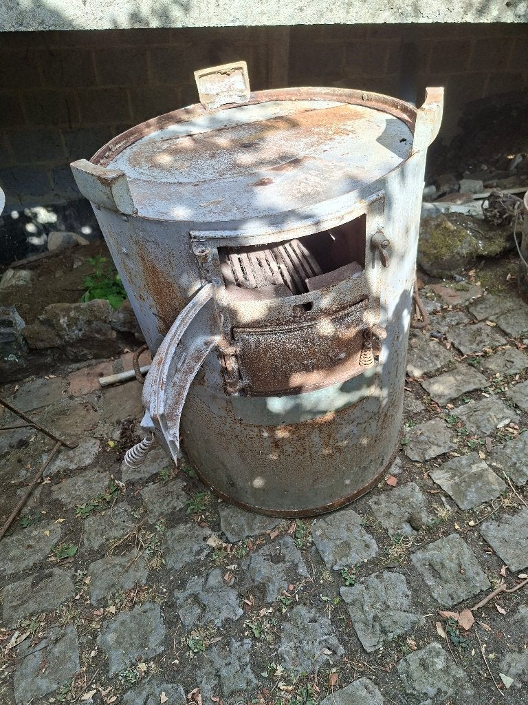 Ancien poêle cylindrique, Enlèvement
