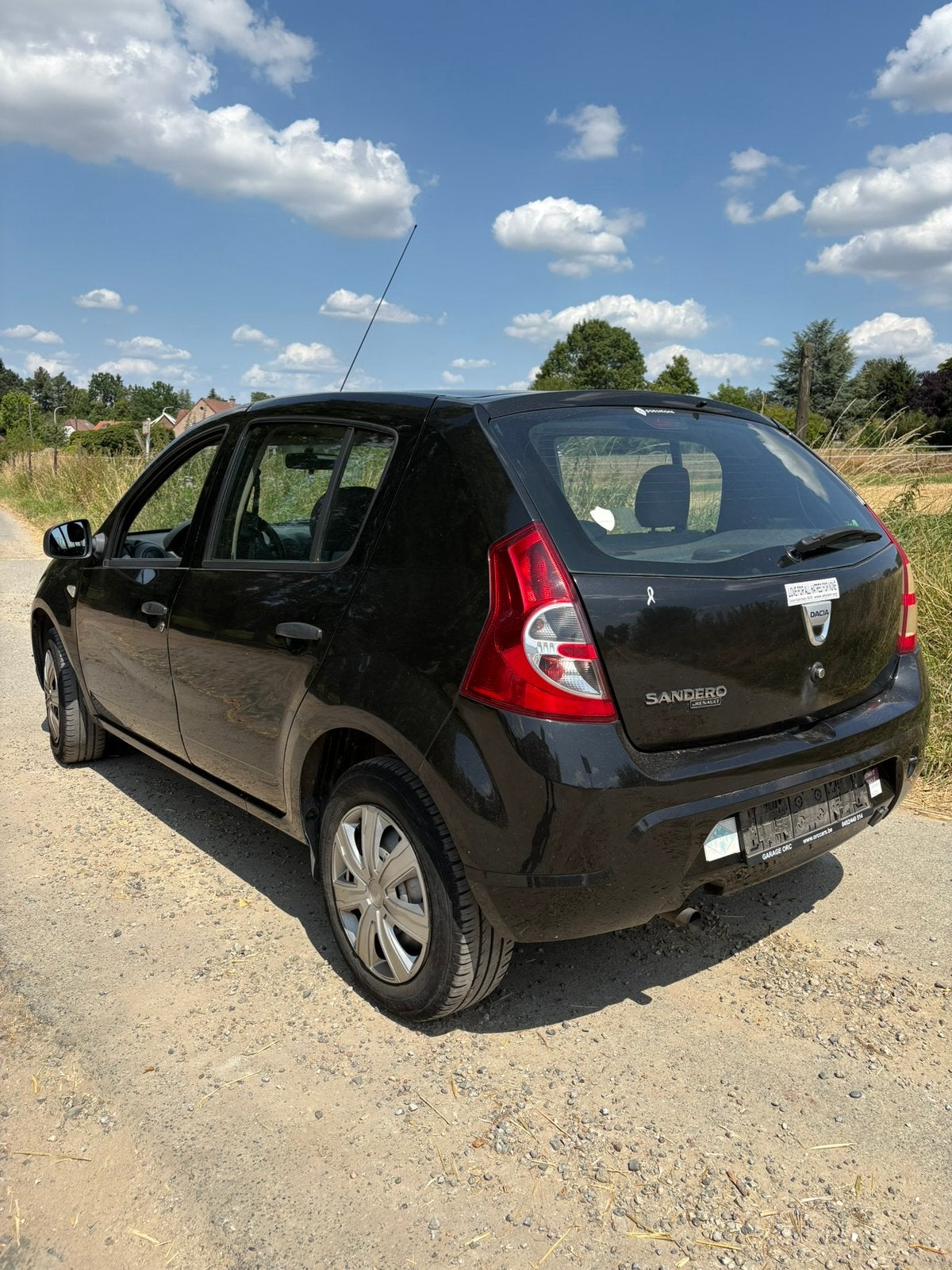 Dacia Sandero 1.2 16V LPG Benzine Zeer zuinig – 233.000 km –, Auto's, 4 cilinders, 1198 cc, Zwart, Bedrijf