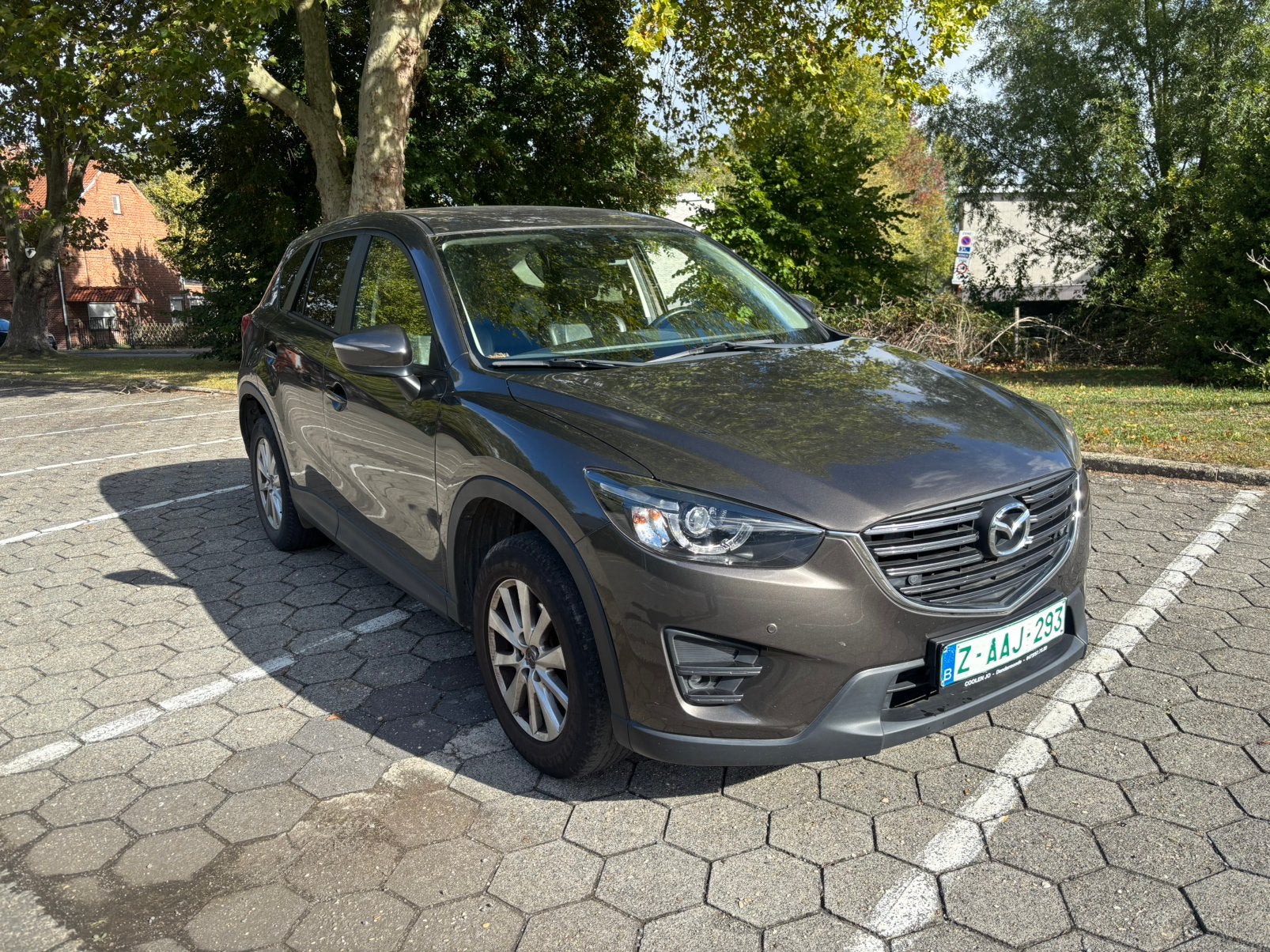 Zeer mooie Mazda CX 5 benzine met mooie opties en garantie., Auto's, Voorwielaandrijving, 139 g/km, Zwart, 4 cilinders