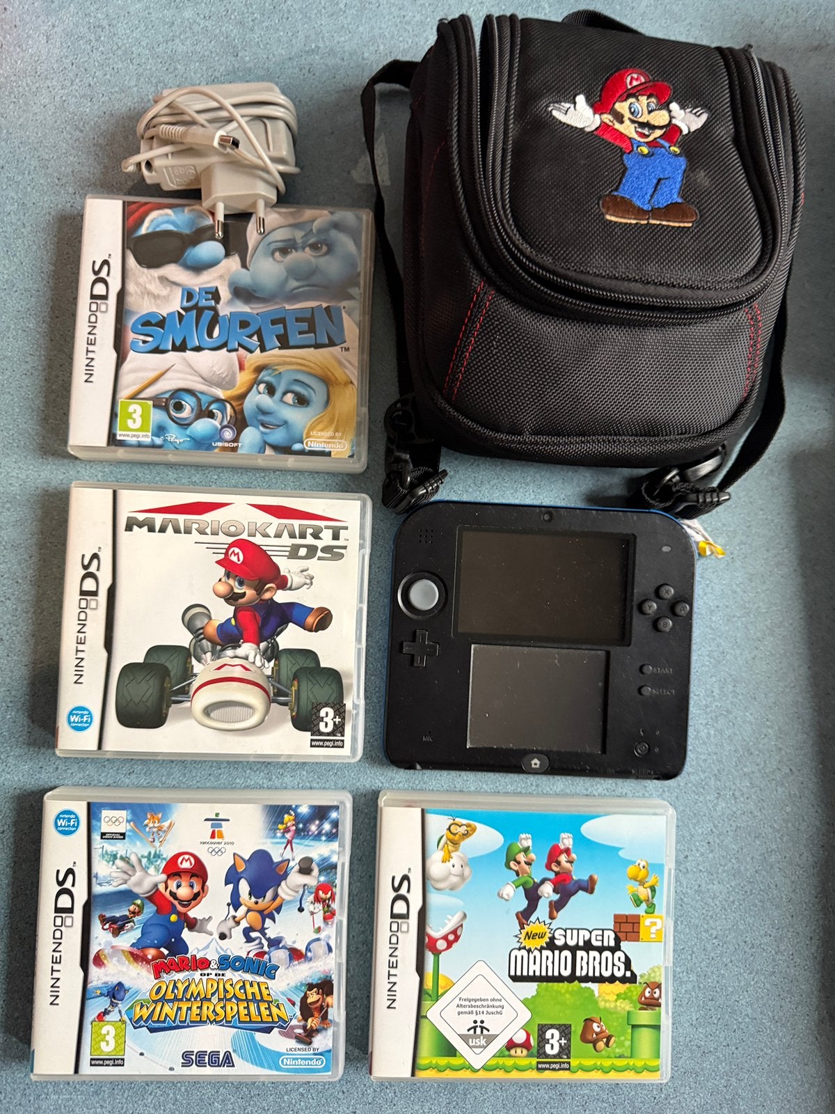 Nintendo 2DS met Mario Tas + Oplader & 4 Games (Vaste Prijs), Consoles de jeu & Jeux vidéo, Enlèvement, Utilisé, Bleu, 2DS