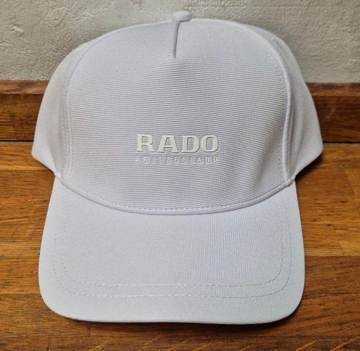 Rado casquette neuve, Pet