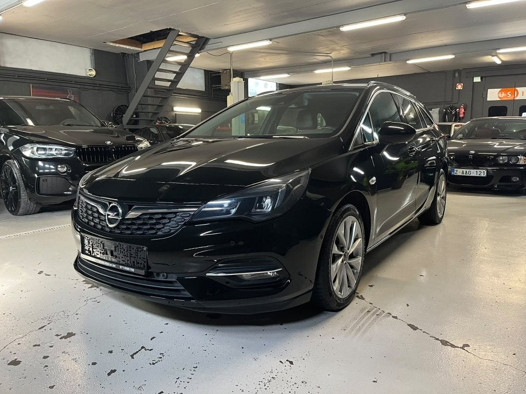 OPEL ASTRA SPORTS TOURER **BOITE AUTO** 12 MOIS DE GARANTIE, Dealer onderhouden, Leder en Stof, Zwart, Bedrijf