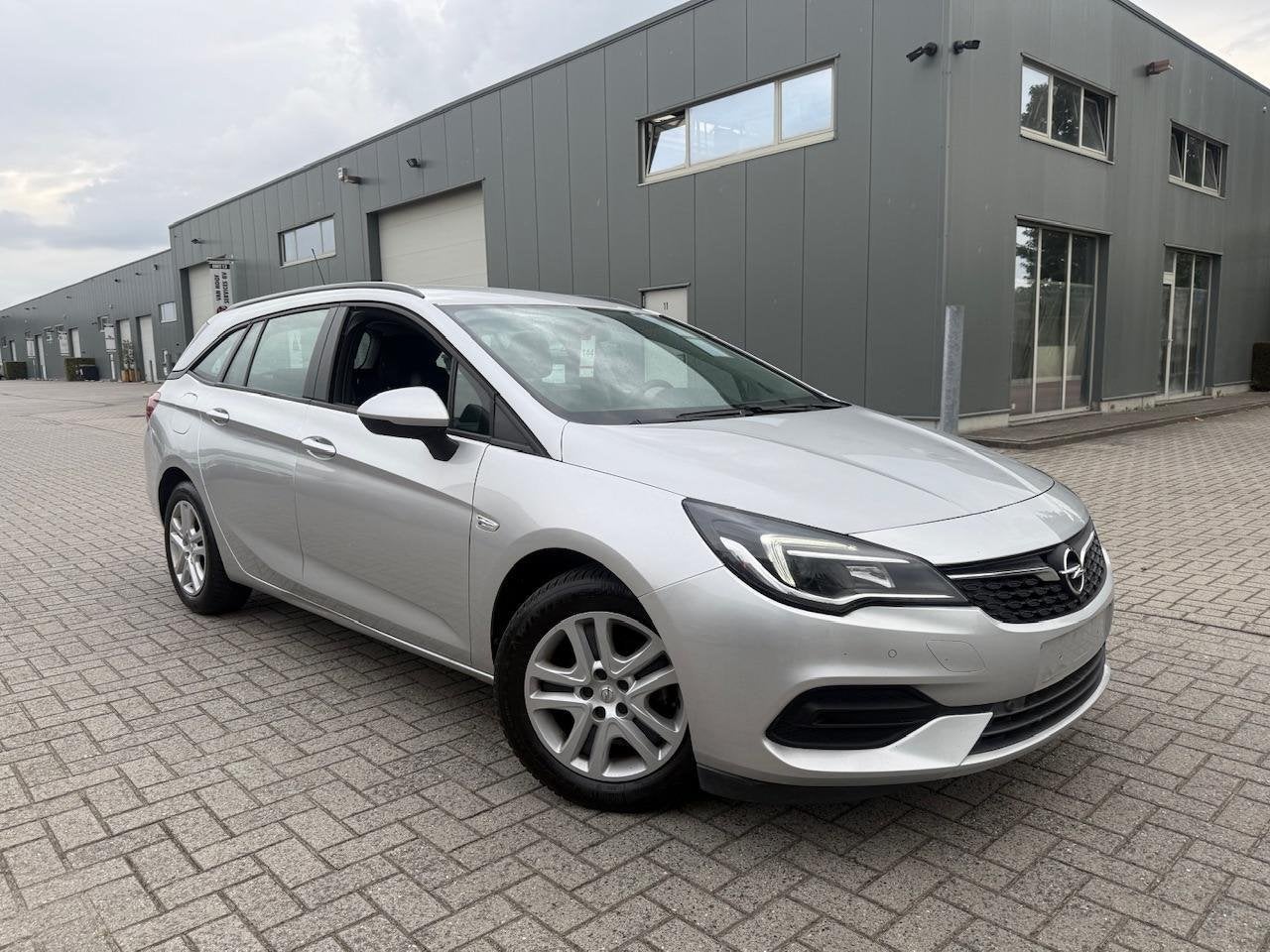 Opel Astra Break 1.2 Benzine | Navigatie | Lage km's, Auto's, Opel, Bedrijf, Te koop, Astra, ABS, Airbags, Airconditioning, Alarm
