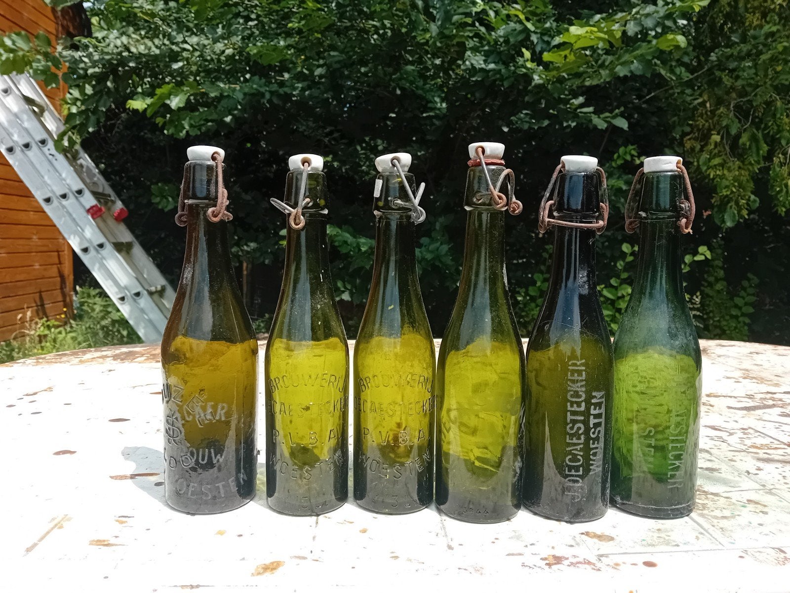 Oude vintage bierflessen brouwerij Decaestecker Deca Woesten, Verzamelen, Ophalen of Verzenden
