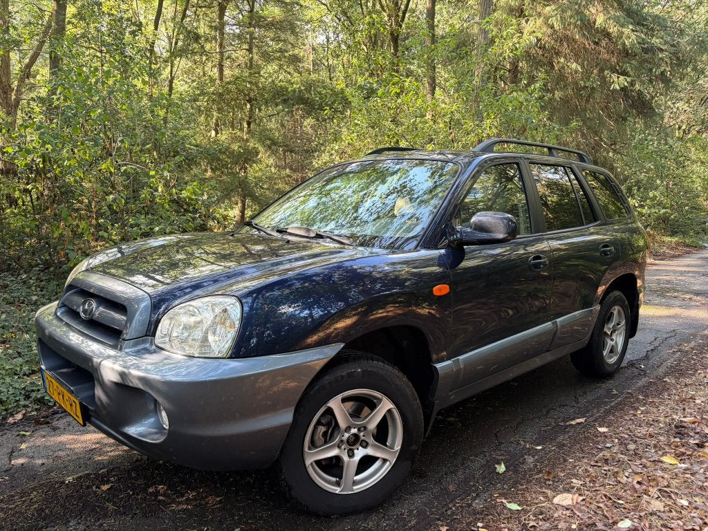 Hyundai Santa Fe 2.0i 16V PANO 2005, Auto's, Voorwielaandrijving, Santa Fe, 2000 kg, Blauw