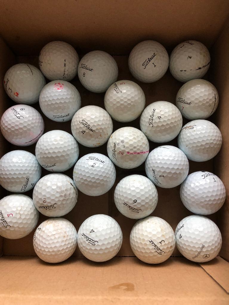 25 golfballen pro v1, Enlèvement