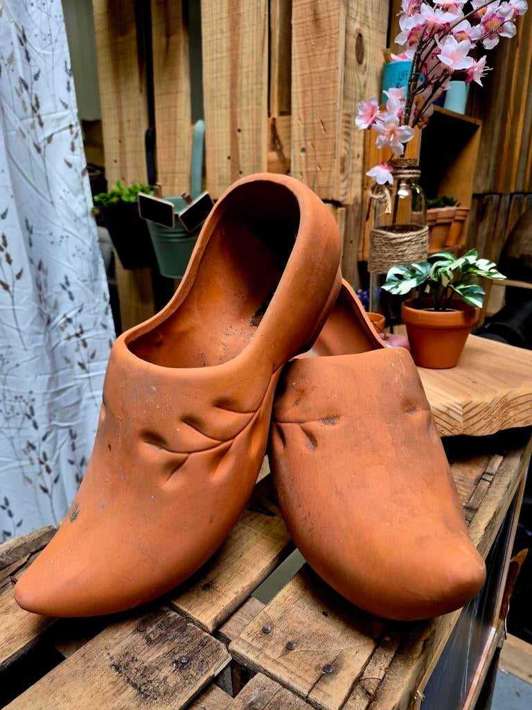 Set terracotta klompen, Ophalen