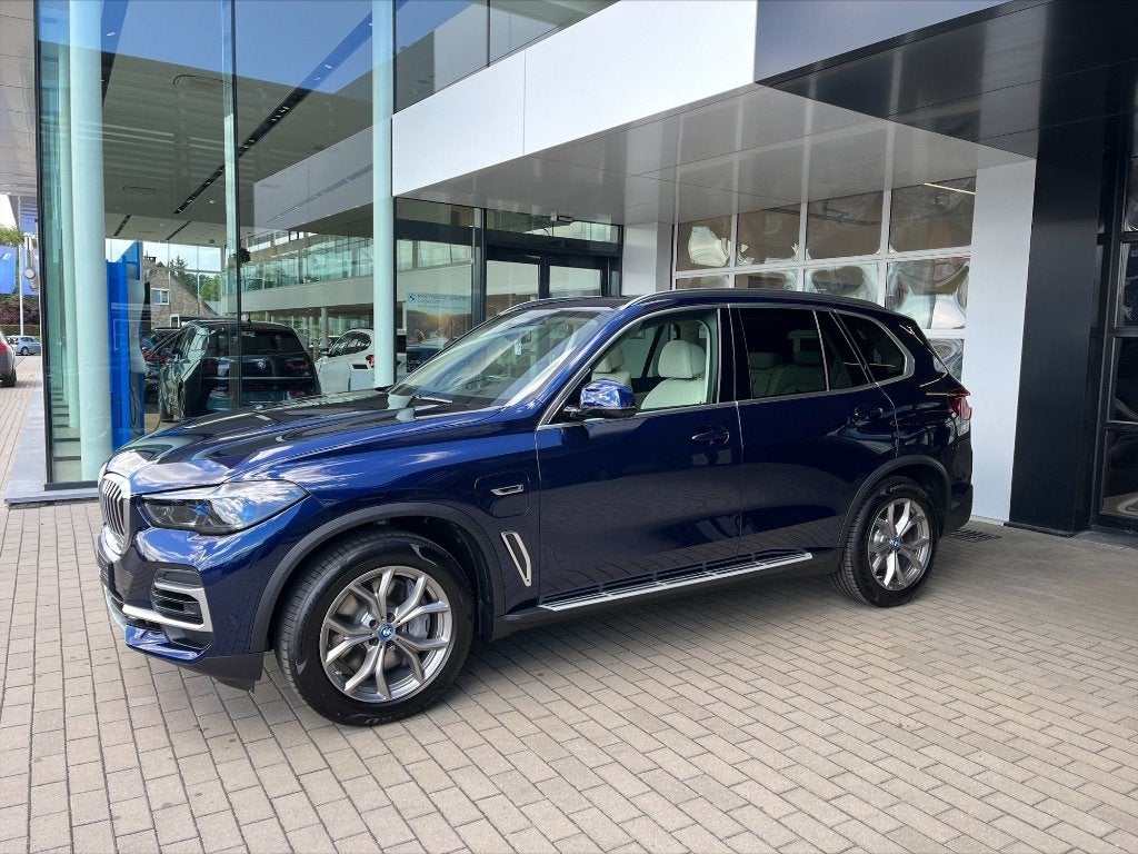 BMW X5 xDrive45e Individual (incl extra set velgen) BTW, Auto's, Automaat, Blauw, Leder, Dealer onderhouden