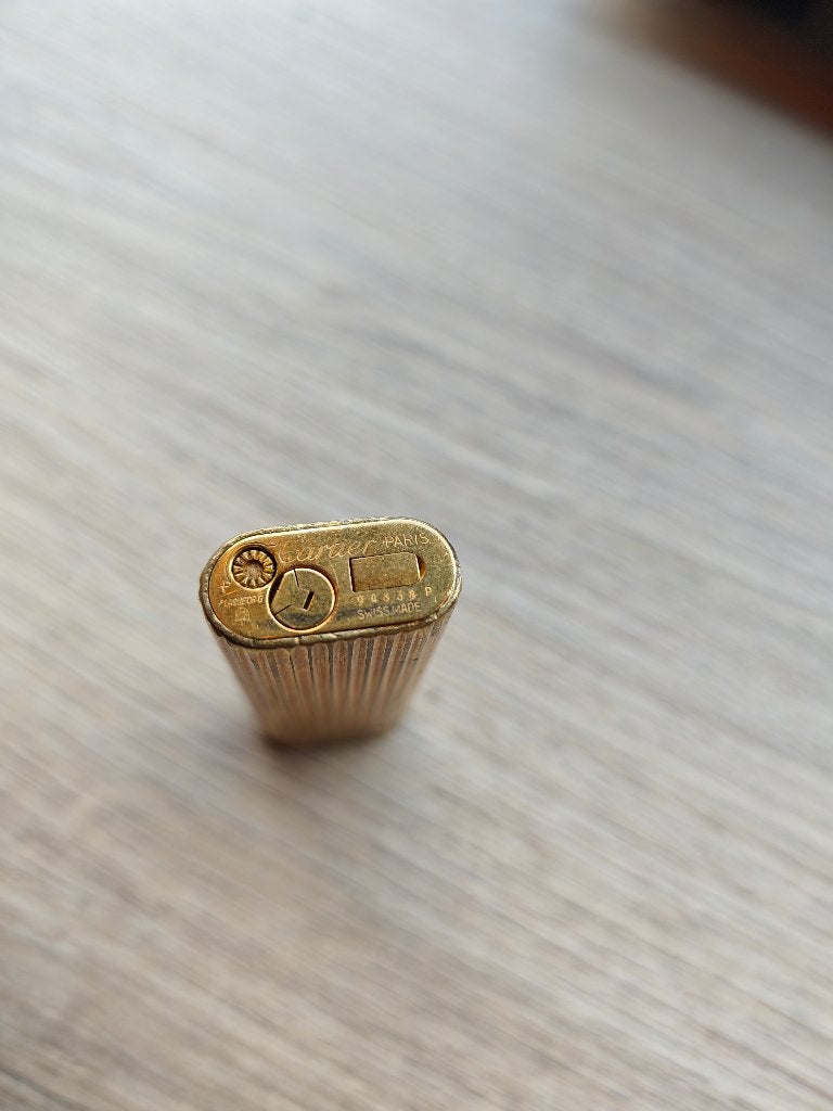 Vergulde Cartier-aansteker, Ophalen, Gebruikt, Aansteker