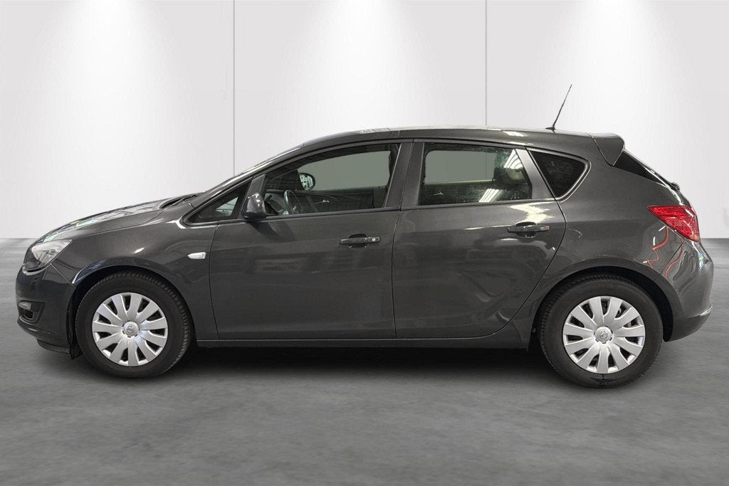 Opel Astra 1.4 Turbo 103kW Aut. Sport, Auto's, Opel, Euro 5, Gebruikt, Bruin, Bedrijf