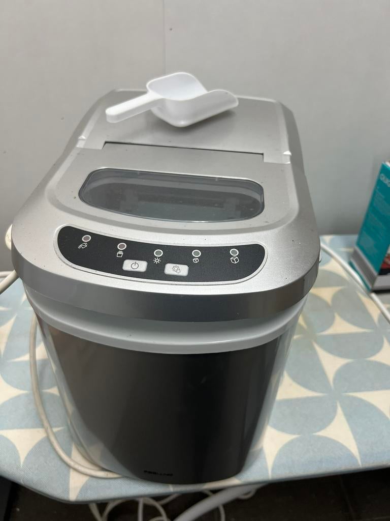 Ijsblokjesmachine, Ophalen