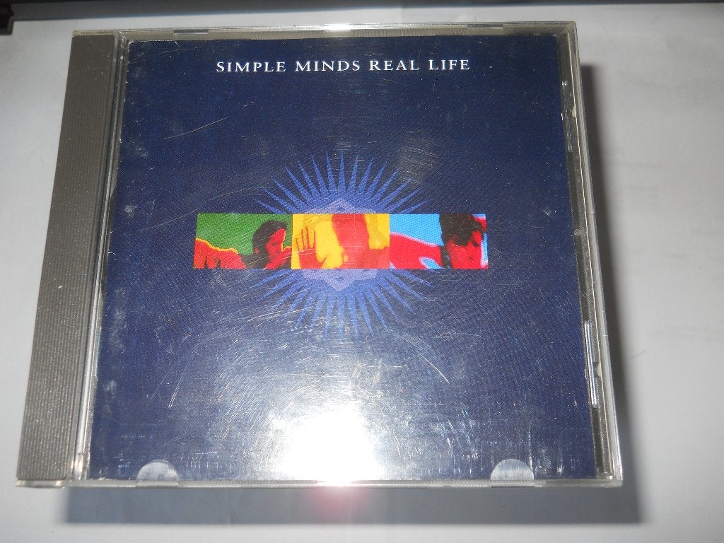 CD - SIMPLE MINDS - REAL LIFE, Pop, Ophalen of Verzenden, Zo goed als nieuw, Eerste persing