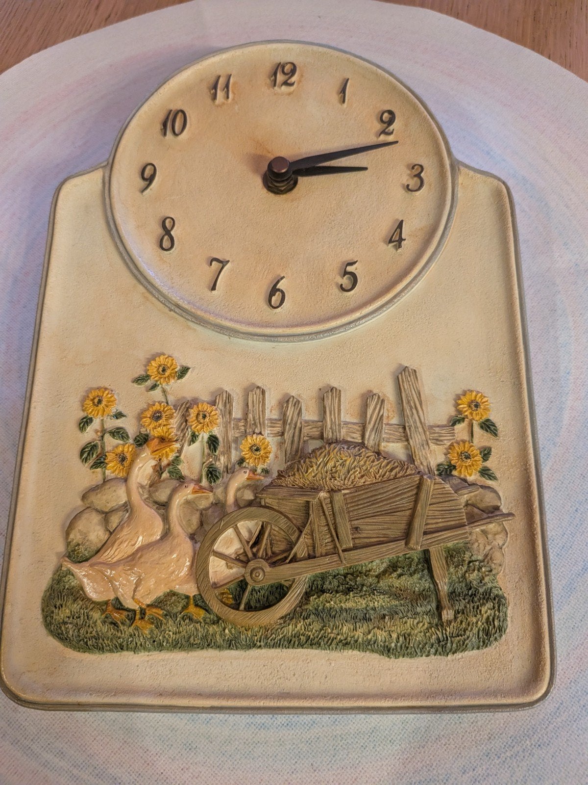 Horloge murale vintage en céramique